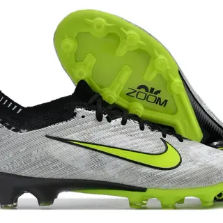 Nike Phantom GT Chaussures de football à crampons pour terrain ferme