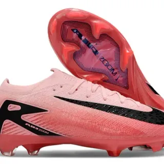 Nike Chuteiras de futebol rosa e preto com upper de knit e asa de calcanhar assimétrica para gramado firme