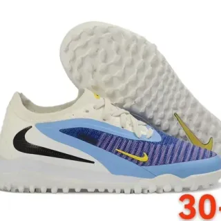 Nike Chaussures de football turf blanc bleu à encolure basse avec upper en maille asimétrique cage asimétrique