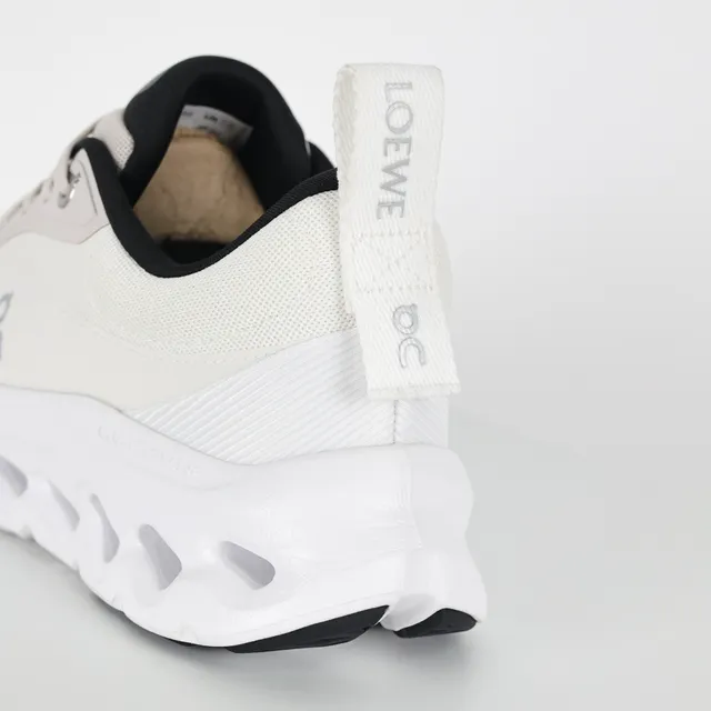 On Cloudmonster Off-White and Black Lifestyle Sneakers 4
