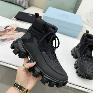 Prada Cloudbust Thunder काला चंक एंगल बूट्स