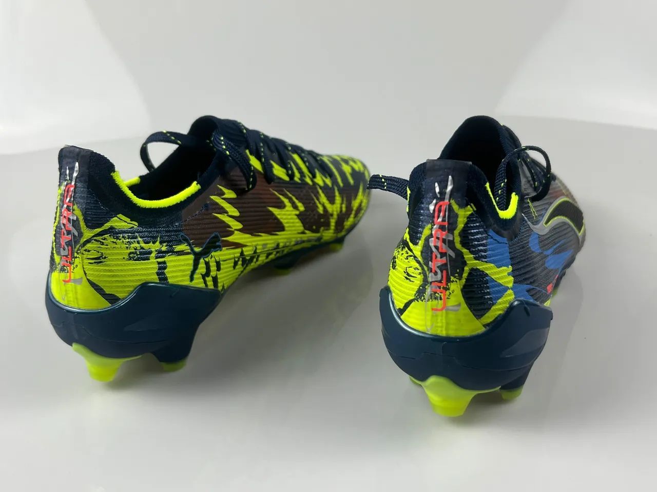 Puma Future Z Navy Yellow অ্যাসিমেট্রিকাল লেসিং টেক্সচার্ড নিট আপার ফার্ম-গ্রাউন্ড সকার শোজ 7