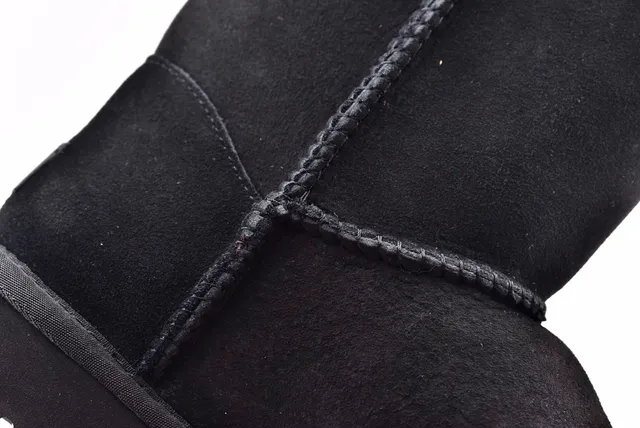 UGG क्लासिक शॉर्ट काली शियरलिंग-लाइन्ड एंगल बूट्स 6