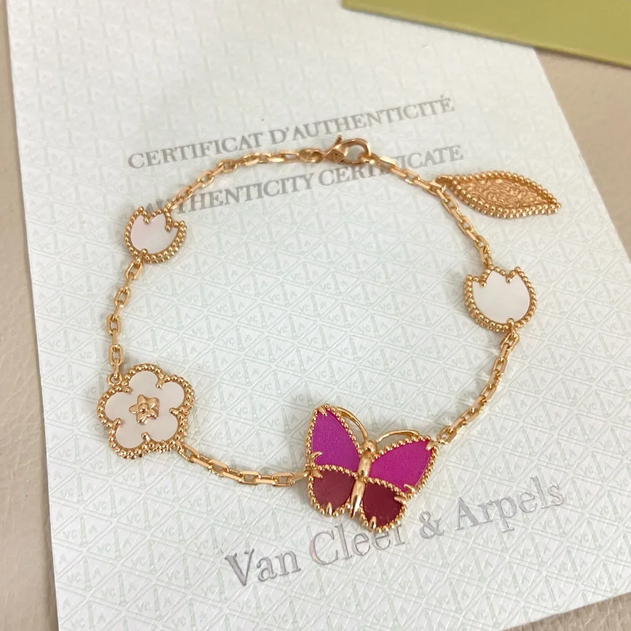 Van Cleef & Arpels 搪瓷蝴蝶和四叶草金链手链 2