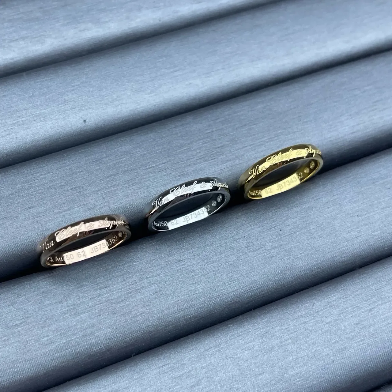 Van Cleef & Arpels Gold Black Engraved Cursive Script Polished Metal Bands Ring 2
