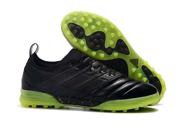 Adidas أحذية كرة القدم Turf بالأسود والبرتقالي مع upper من النسج والصناعي 3 شرائط 6