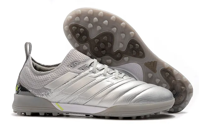 Adidas أحذية كرة القدم Turf بالأسود والبرتقالي مع upper من النسج والصناعي 3 شرائط 9