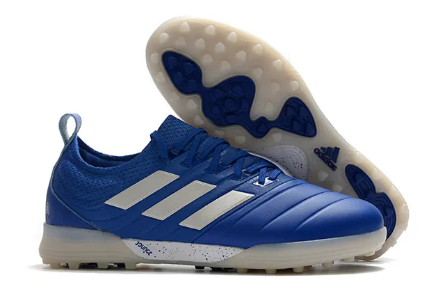Adidas أحذية كرة القدم Turf بالأسود والبرتقالي مع upper من النسج والصناعي 3 شرائط 12