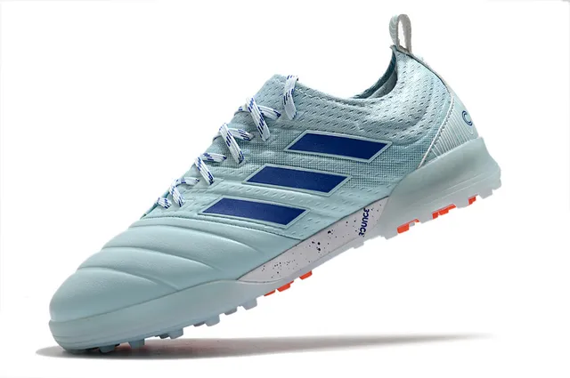 Adidas أحذية كرة القدم Turf بالأسود والبرتقالي مع upper من النسج والصناعي 3 شرائط 16