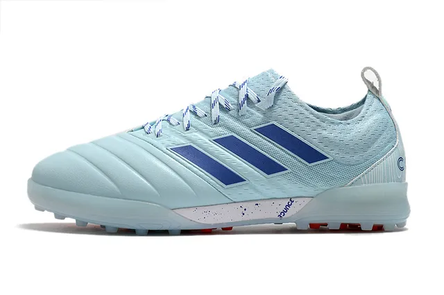 Adidas أحذية كرة القدم Turf بالأسود والبرتقالي مع upper من النسج والصناعي 3 شرائط 17