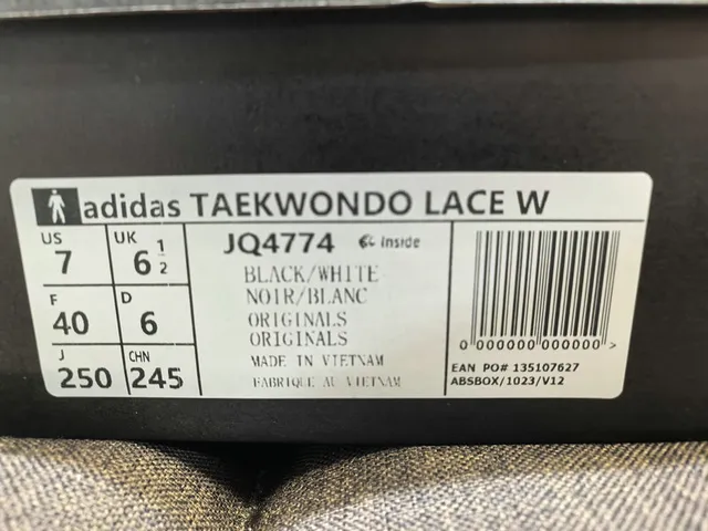Adidas Chaussures de football intérieur cuir noir blanc sans lacets matelassées 22
