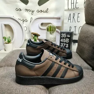 Adidas بني أسود low-top جلد أسلوب حياة حذاء رياضي
