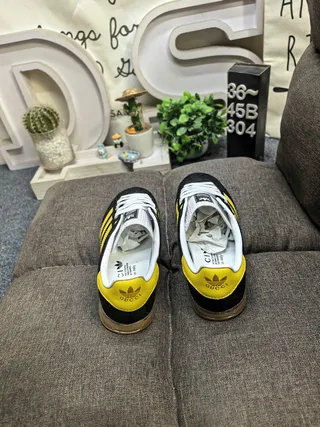 Adidas Gazelle أحذية رياضية أسود وأصفر بنمط حياة 8