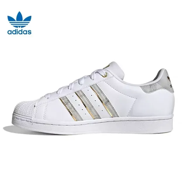 Adidas Superstar Chaussures Lifestyle Blanc et Or avec Rayures Marbrées 9