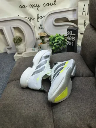 Adidas أبيض أصفر شبكة مهندسة علوة مصقولة كعب رولكر وسطي حذاء جري 6