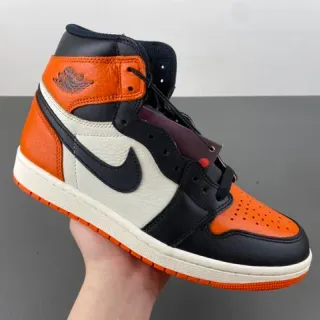Tênis de basquete cano alto Air Jordan com cabedal em couro e sintético laranja e preto