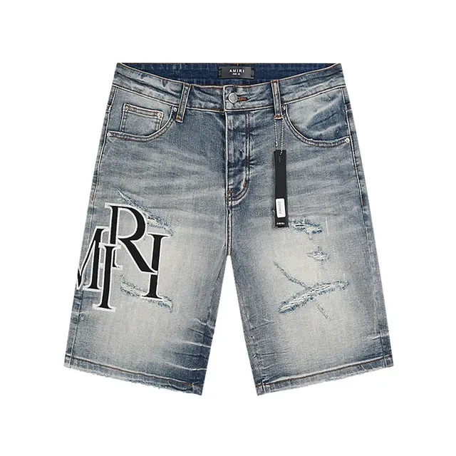 Amiri shorts azul branco distressed light-wash denim grandes bordados monogram 2