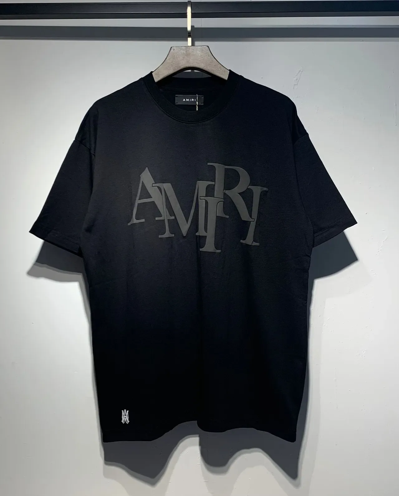 Camiseta Amiri logo apilado corte holgado 11