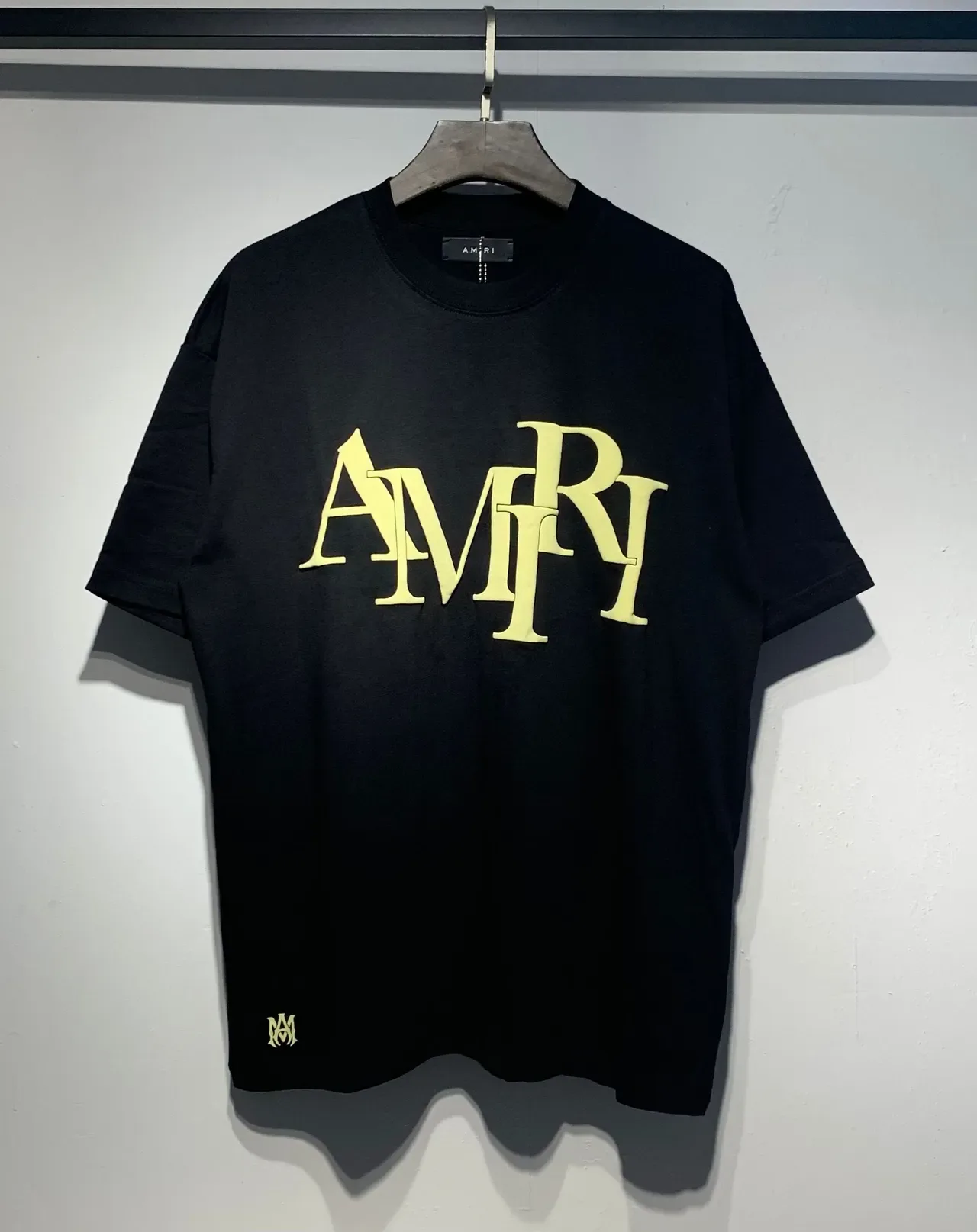 Camiseta Amiri logo apilado corte holgado 12