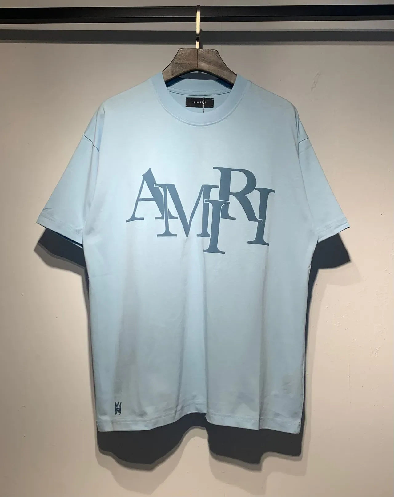 Camiseta Amiri logo apilado corte holgado 13