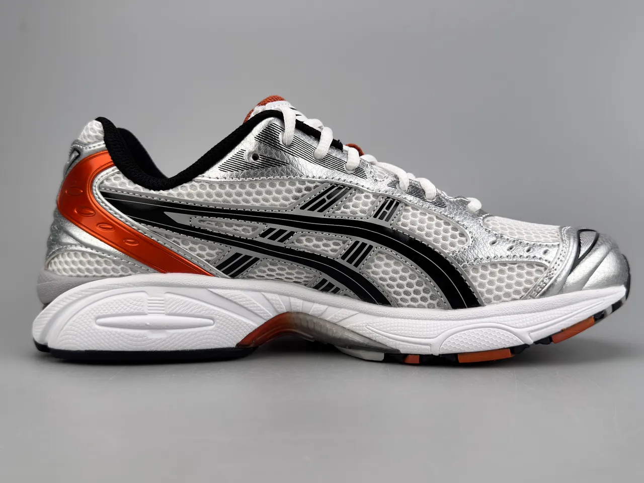 ASICS Gel-Kayano argent noir orange chaussures de course 10