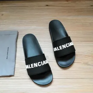 Balenciaga Slide sandales noires avec logo