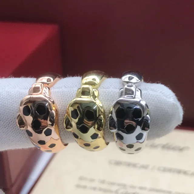 Cartier Anel de banda aberta com motivo de cabeça de pantera negra em ouro 2