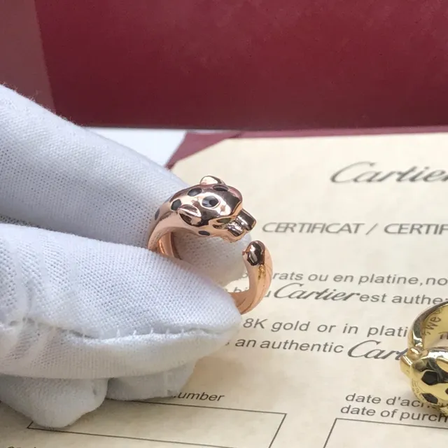 Cartier Anel de banda aberta com motivo de cabeça de pantera negra em ouro 4