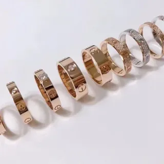 Cartier Love Ring Rose Gold and White Gold Pavé Diamond and Solitaire Rings