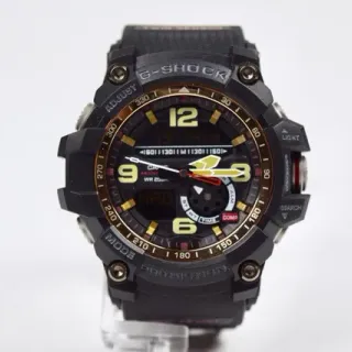 Casio G-Shock GA-100 Montre Sportive Noire et Or