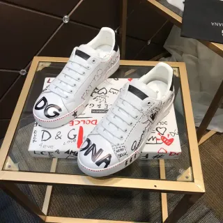 Dolce & Gabbana Tênis lifestyle brancos e pretos com impressão gráfica de couro low-top com cadarços