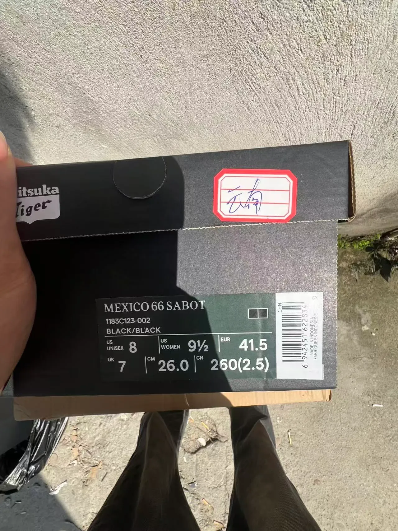 Chinelos pretos de tecido trançado 10