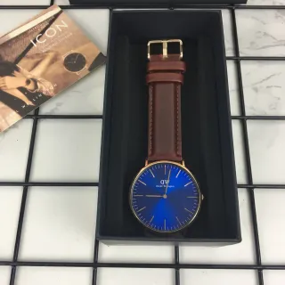 Daniel Wellington नीला भूरा मिनिमलिस्ट सनबर्स्ट डायल क्वार्ट्ज वॉच