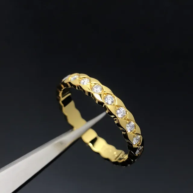 خاتم حامل شبكة منسوجة ذهبي وفضي Pavé-Set أحجار دائرية 2