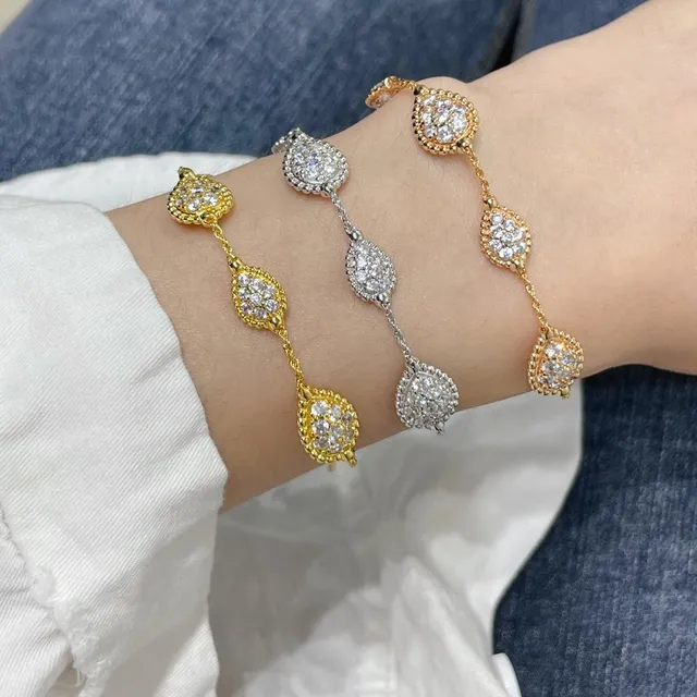 Bracelet chaîne torsadée en corde ton doré motif pavé de diamants 8