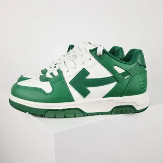 Zapatillas low-top de cuero verde y blanco con paneles y logo de flecha