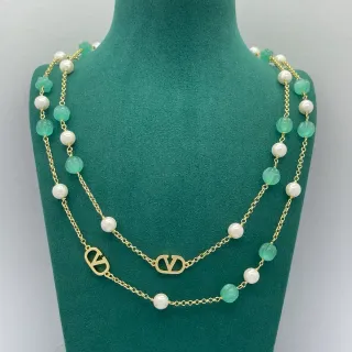 Collier de perles vert et or à deux rangs