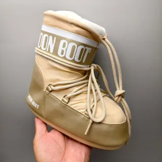 Moon Boot क्लासिक मेटालिक गोल्ड शीयरलिंग-लाइन्ड स्नो बूट