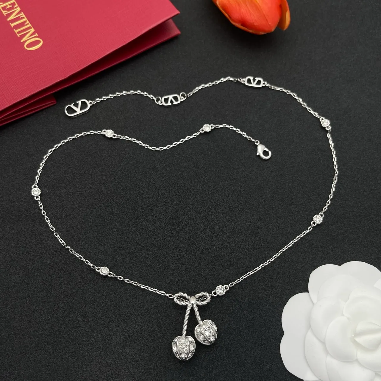 Silver-Tone Bow and Cherry Pendant Necklace 8