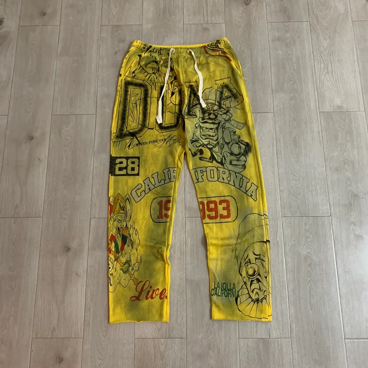 Pantalones de chándal amarillos con impresión gráfica, cintura con cordón y talla relajada 5