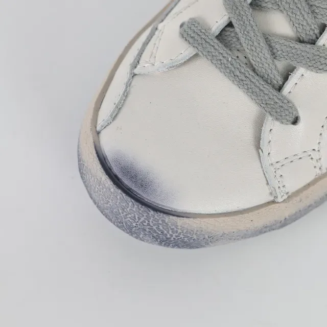 Golden Goose Superstar Zapatillas Lifestyle Blancas Naranja Suela distressed Parche Estrella Lateral 5