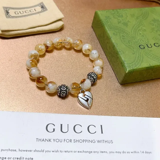 Gucci Pulsera de Cuentas Plateadas Beige con Piedras Ámbar y Blanco 7