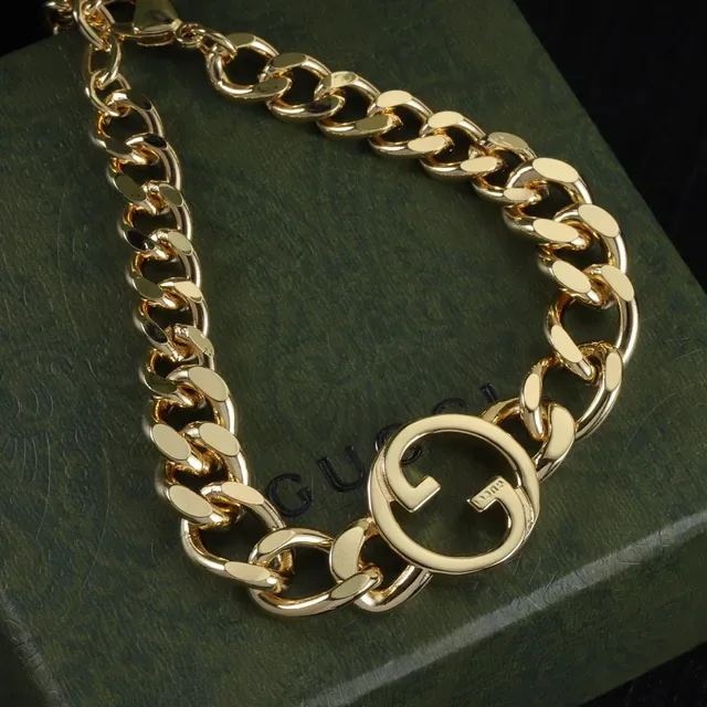 Gucci GG Marmont سوار سلسلة كرب لينك كثيفة مركز شعار G متداخل ذهبي 2