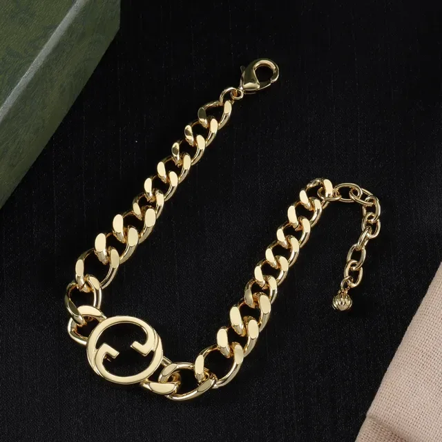 Gucci GG Marmont سوار سلسلة كرب لينك كثيفة مركز شعار G متداخل ذهبي 4