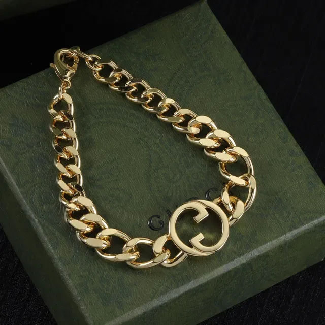Gucci GG Marmont سوار سلسلة كرب لينك كثيفة مركز شعار G متداخل ذهبي 6