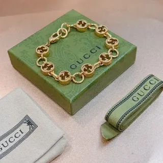 سوار Gucci GG Marmont ذهبي أخضر نمط Interlocking G