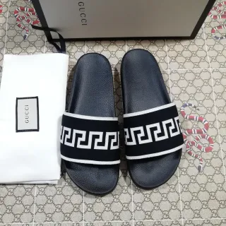 Gucci Greca Slide 黑色和白色拖鞋