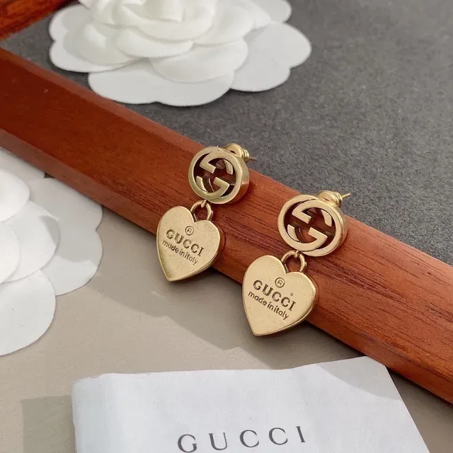 Gucci أقراط Interlocking G تيارم قلب ذهبي اللون 8