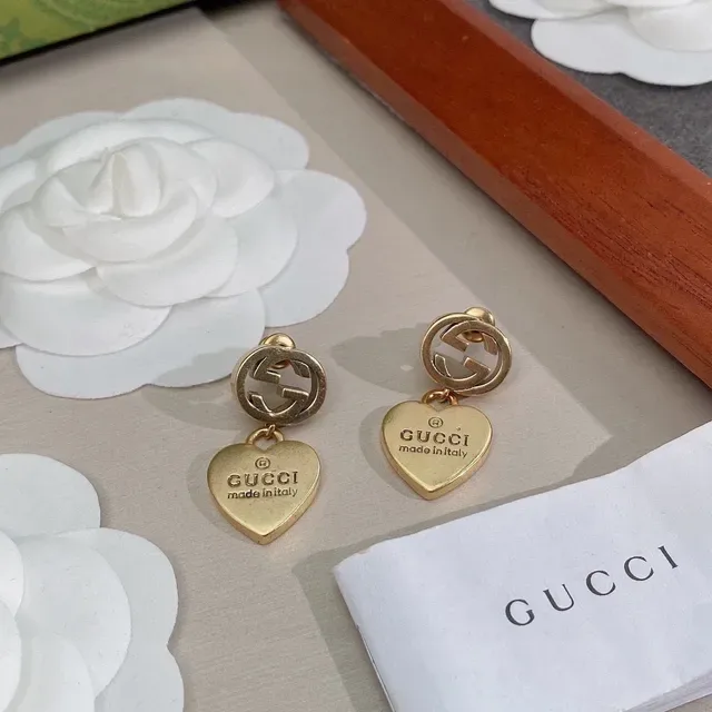 Gucci أقراط Interlocking G تيارم قلب ذهبي اللون 9
