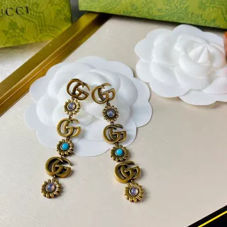 Gucci Interlocking GG أقراط قطرة زهورية